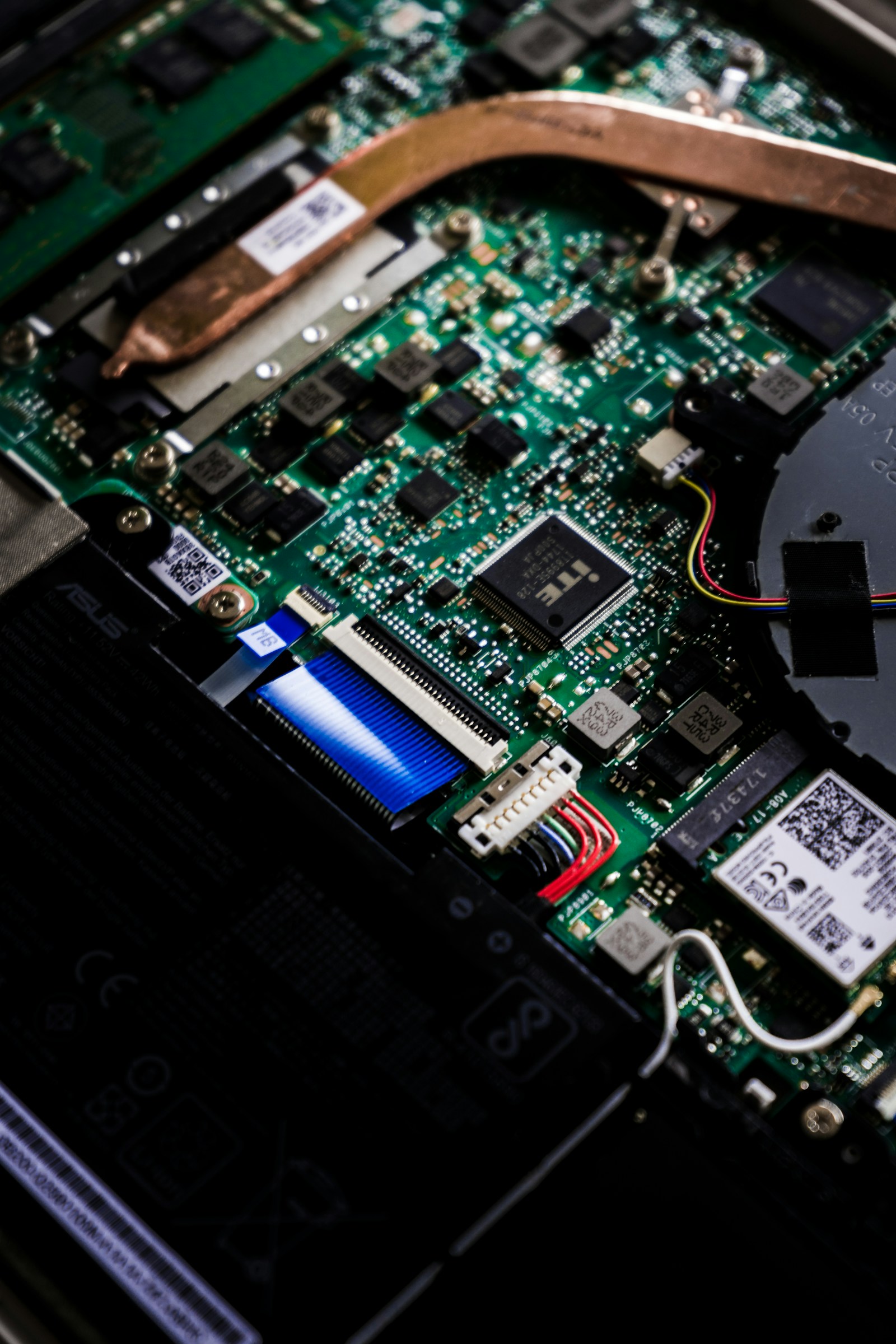 Laptop internals exposed for diagnosis on the Perth workshop bench